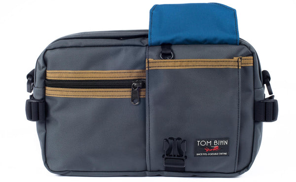 The LGD in Nebulous Grey/Coyote/Island. Front view, front buckle pocket lifted up to show the Island lining.